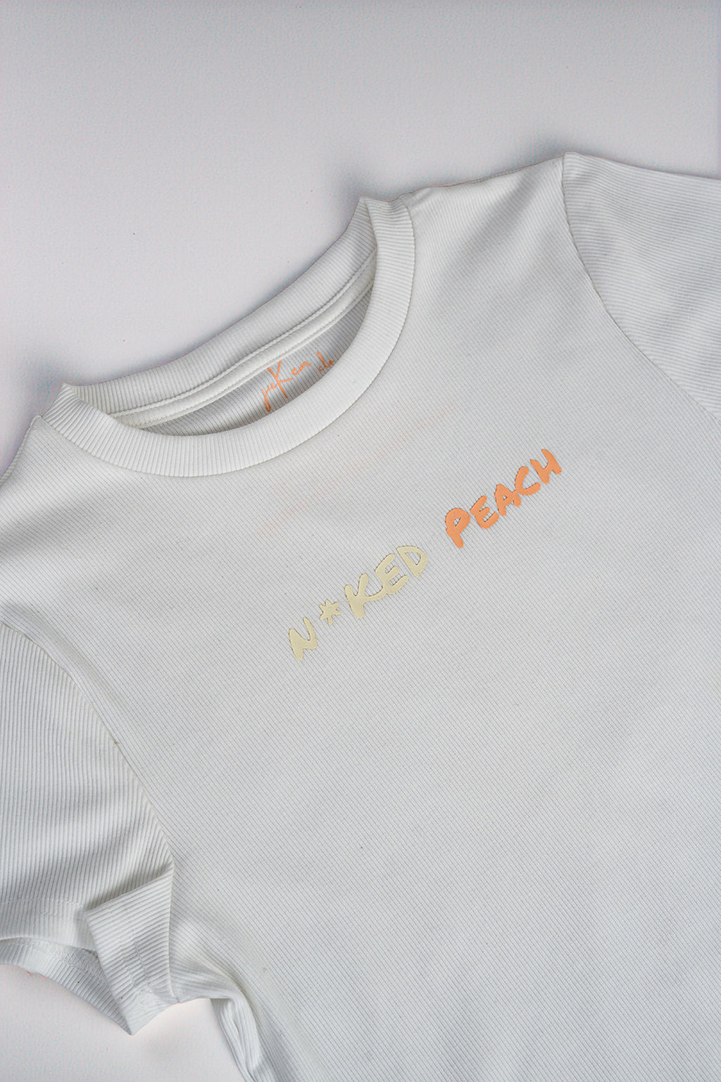 N*ked Peach Tee