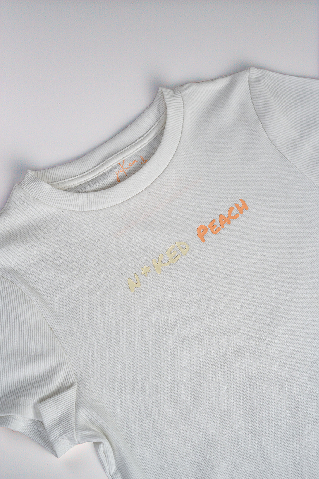 N*ked Peach Tee